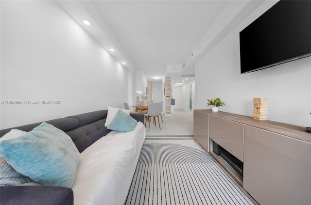 living room with light colored carpet