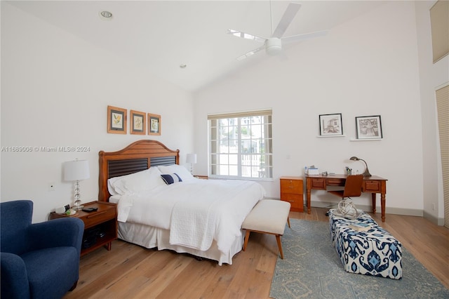 bedroom with high vaulted ceiling, light hardwood / wood-style flooring, and ceiling fan