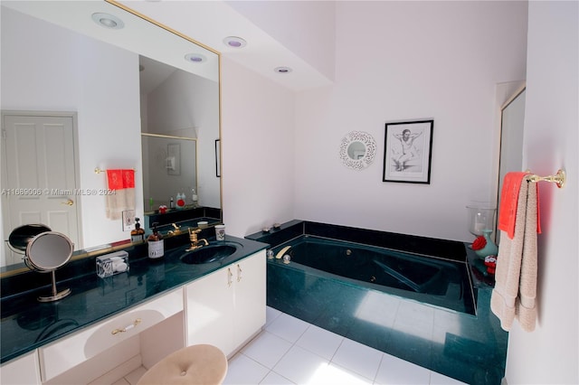 bathroom featuring vanity, independent shower and bath, and tile patterned flooring