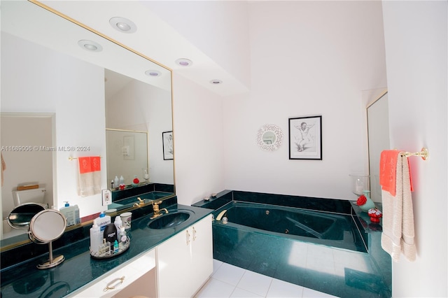 bathroom featuring tile patterned flooring, vanity, and independent shower and bath