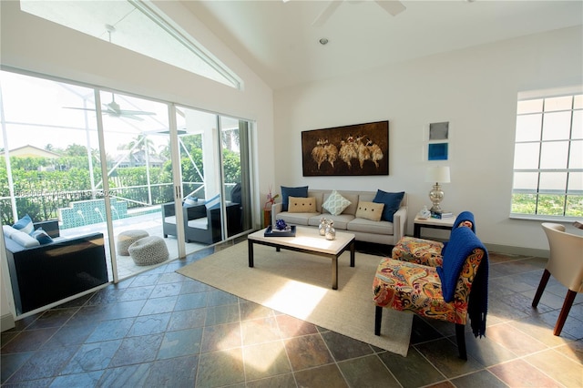 living room featuring lofted ceiling and ceiling fan