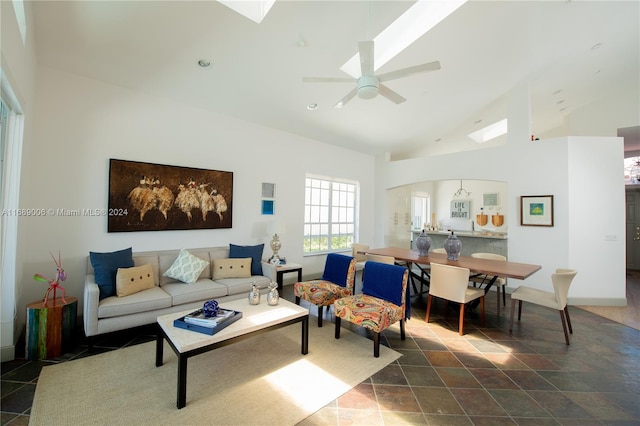 living room with vaulted ceiling and ceiling fan