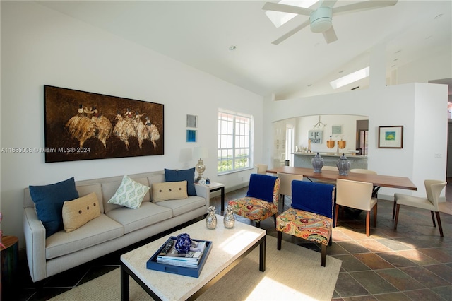 living room with lofted ceiling and ceiling fan