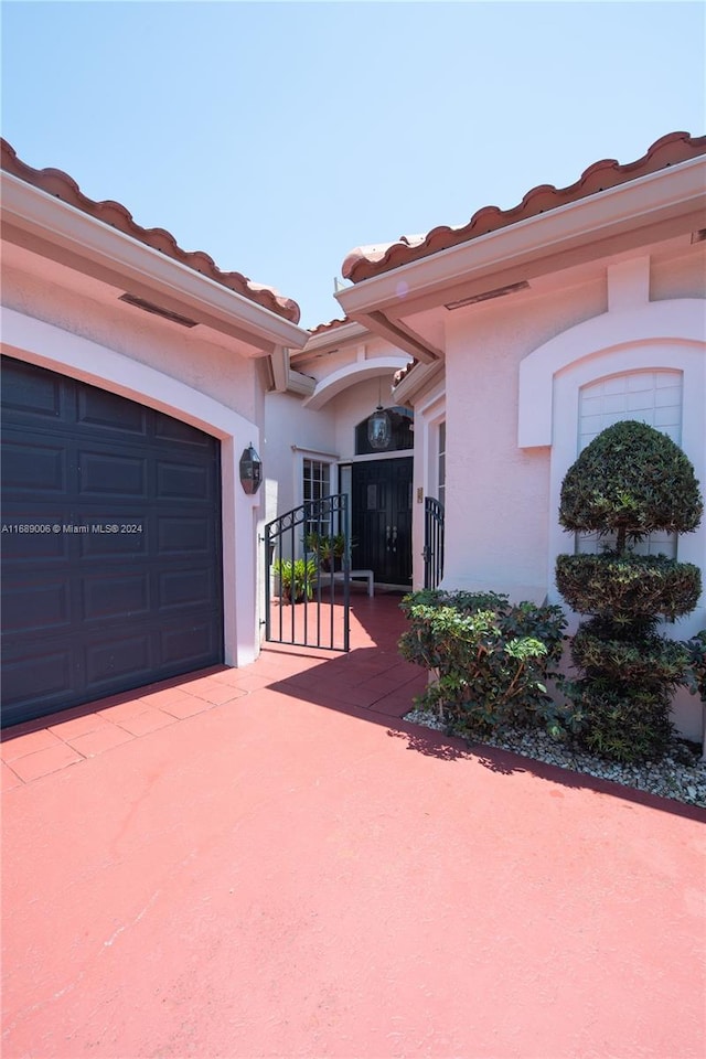 exterior space with a garage