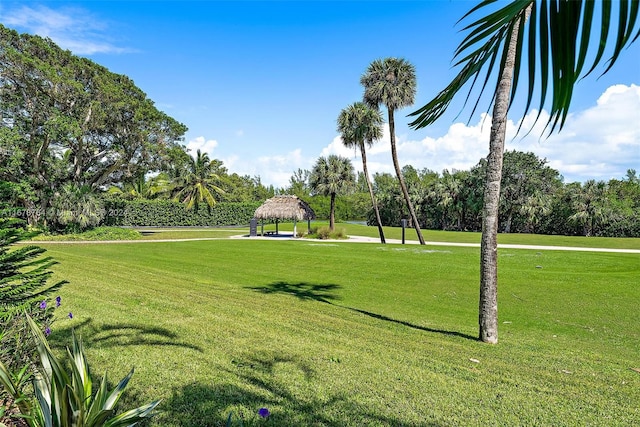 surrounding community featuring a lawn and a gazebo