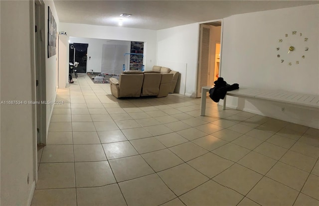 living room featuring light tile patterned flooring