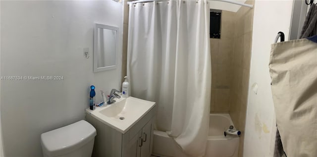 full bathroom with vanity, toilet, and shower / tub combo with curtain