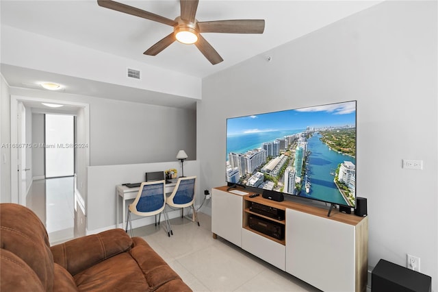 living room with light tile patterned flooring and ceiling fan