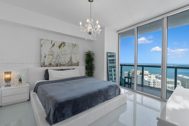 bedroom with multiple windows, tile patterned floors, expansive windows, and a water view