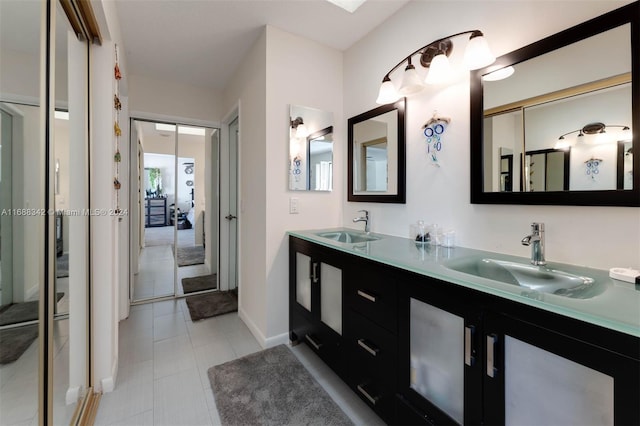 bathroom with vanity and tile patterned floors