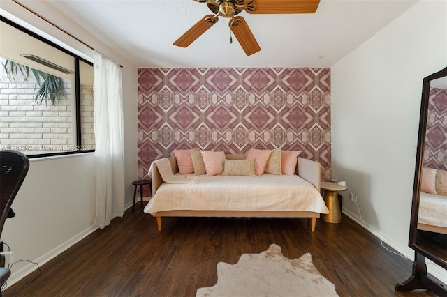 bedroom featuring hardwood / wood-style floors and ceiling fan