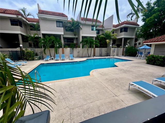 view of swimming pool with a patio area