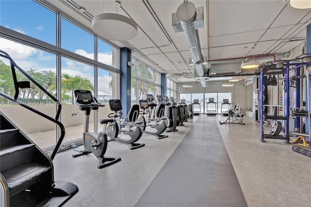 exercise room with expansive windows