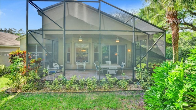 rear view of property featuring a patio area