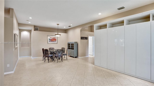 dining room featuring light tile patterned floors