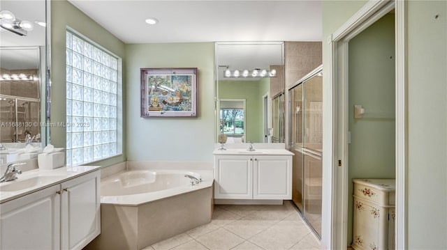 bathroom featuring vanity, tile patterned floors, and independent shower and bath