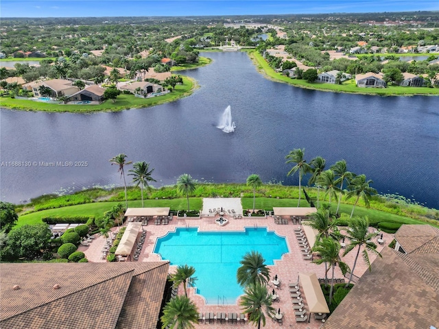 view of pool featuring a water view