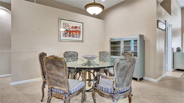 dining room with light tile patterned floors