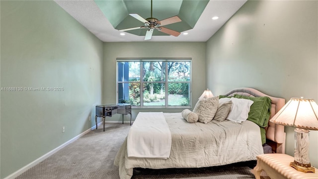 carpeted bedroom featuring ceiling fan