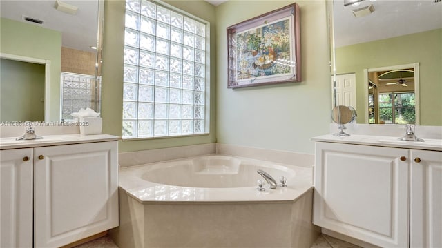 bathroom featuring vanity, ceiling fan, and shower with separate bathtub