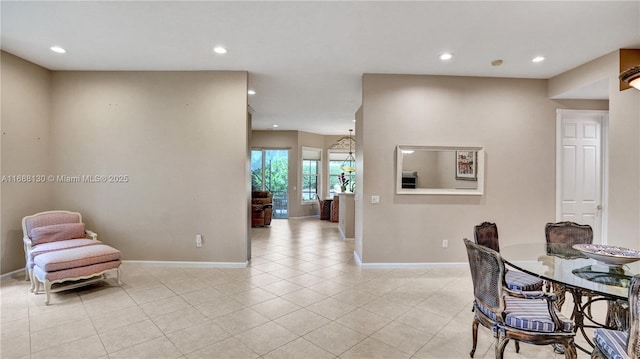 dining area with light tile patterned floors