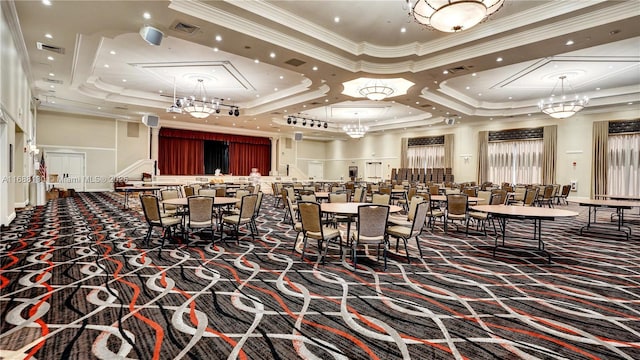 interior space with a raised ceiling and crown molding