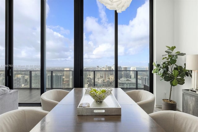 dining area with a wall of windows