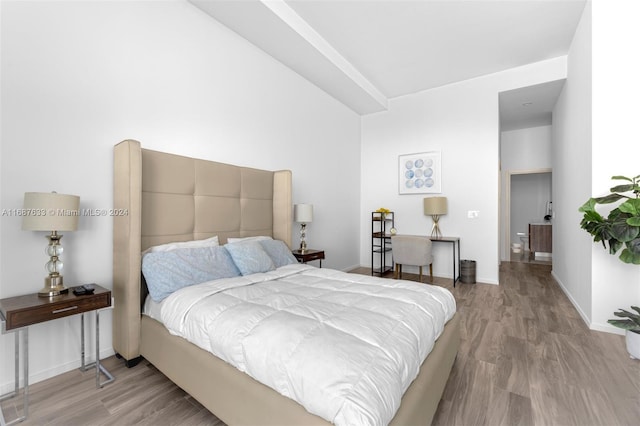 bedroom with light wood-type flooring