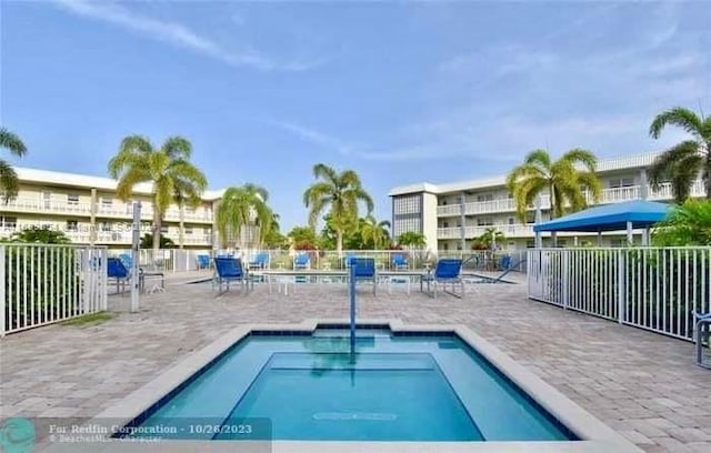 view of swimming pool featuring a patio