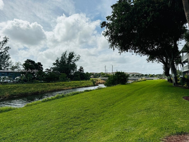 view of yard with a water view