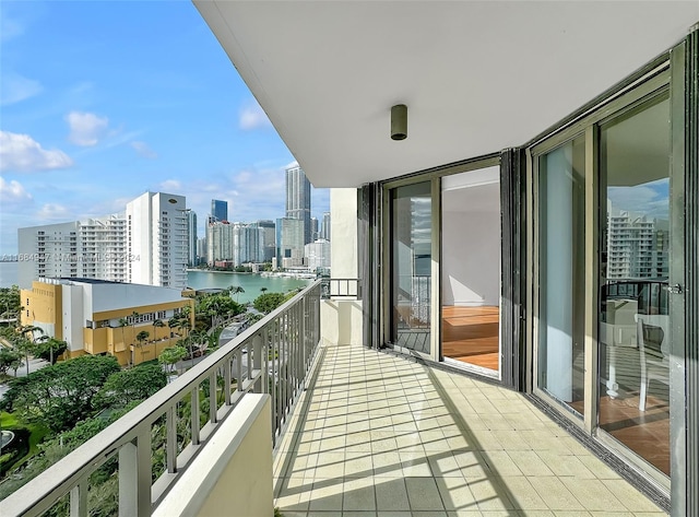 balcony featuring a water view