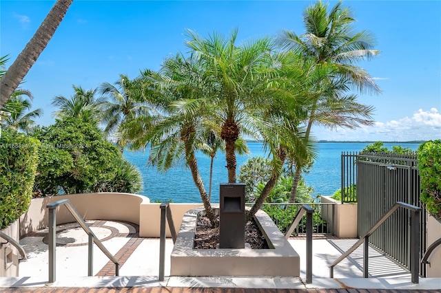 view of patio / terrace with a water view