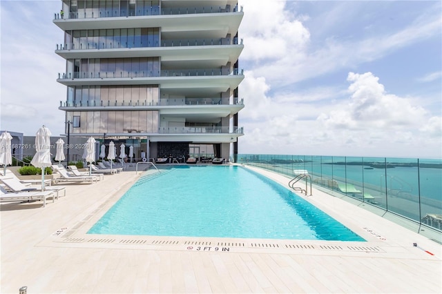 view of pool featuring a patio