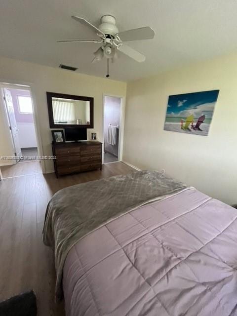 bedroom featuring hardwood / wood-style floors and ceiling fan