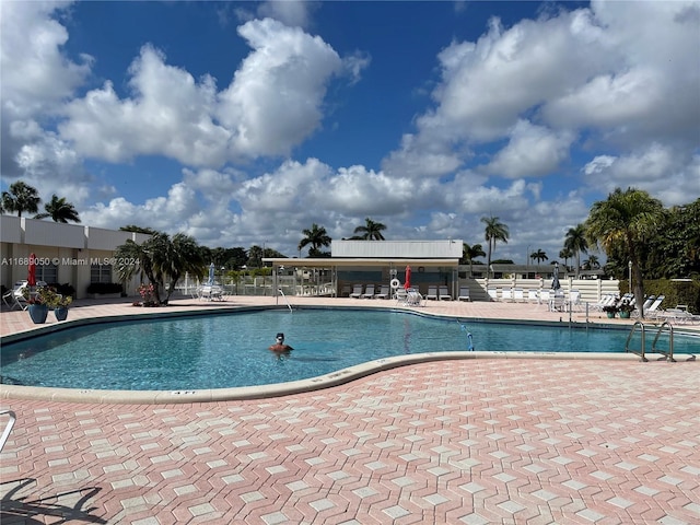 view of swimming pool featuring a patio