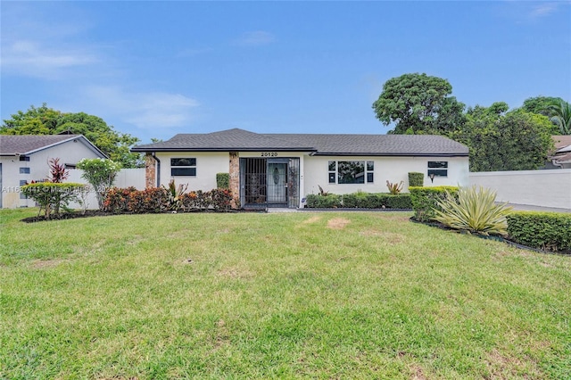 view of front of house with a front lawn