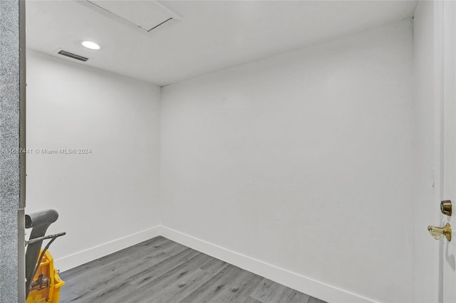 spare room featuring hardwood / wood-style floors