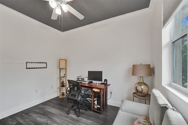 home office with dark hardwood / wood-style flooring and ceiling fan