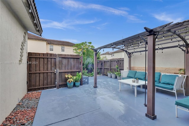 view of patio featuring outdoor lounge area and a pergola