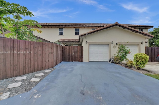 view of front of home with a garage