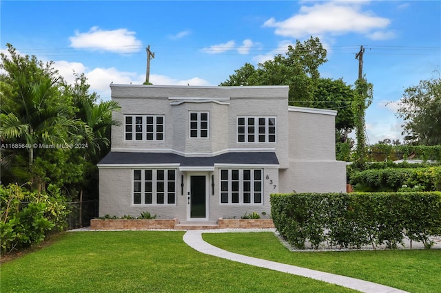 view of front of home with a front yard