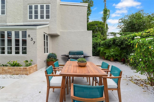 view of patio / terrace featuring a grill