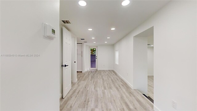837 El Rado St, Coral Gables, FL 33134 - hallway with recessed lighting, light wood-style floors, and baseboards