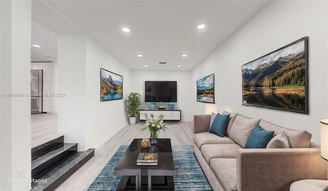 837 El Rado St, Coral Gables, FL 33134 - living area featuring wood finished floors, recessed lighting, and baseboards