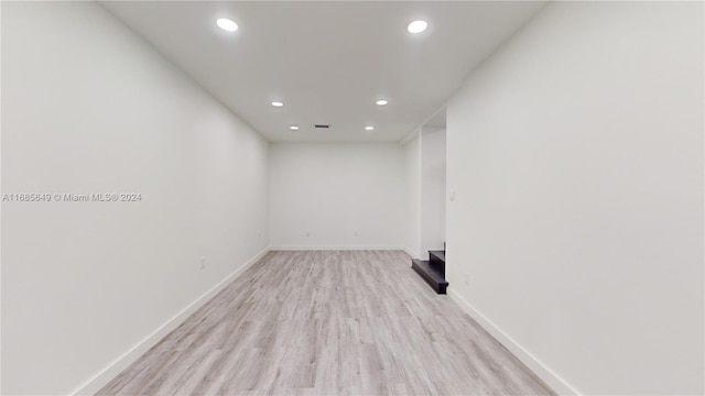 spare room featuring light hardwood / wood-style floors