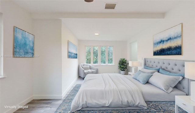 bedroom featuring hardwood / wood-style flooring