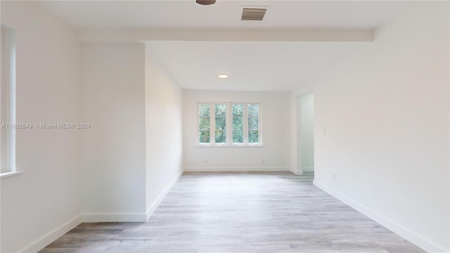 837 El Rado St, Coral Gables, FL 33134 - empty room with light wood finished floors, baseboards, and recessed lighting