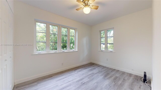 837 El Rado St, Coral Gables, FL 33134 - unfurnished room featuring light wood finished floors, baseboards, and a ceiling fan