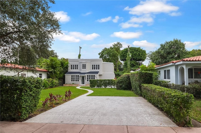 837 El Rado St, Coral Gables, FL 33134 - view of front of property featuring a front yard and stucco siding