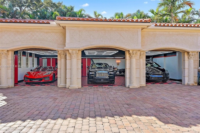 exterior space with a carport